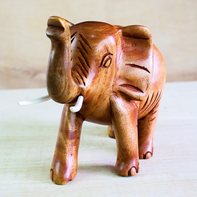 Wood sculpture, 'Adorable Elephant' - Hand-Carved Teak Wood Elephant Sculpture from Ghana