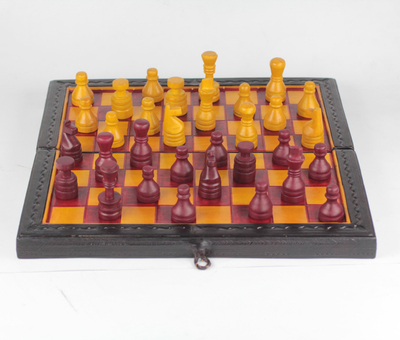 Leather travel chess set, 'Royal Battle' - Red and Yellow Leather Travel Chess Set from Ghana