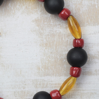 Recycled glass beaded stretch bracelet, 'Unending Affection' - Black Red and Honey Brown Recycled Glass Stretch Bracelet