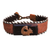 Ebony wood and leather cuff bracelet, 'Charming Sankofa' - Ebony Wood and Leather Adinkra Cuff Bracelet from Ghana thumbail