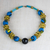 Perlenkette aus recyceltem Kunststoff, „Eco Ahoufe“ – Perlenkette aus recyceltem Kunststoff und Baumwolle in Blau