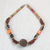 Recycled plastic beaded pendant necklace, 'Anytime Beauty' - Recycled Plastic Beaded Pendant Necklace in Brown from Ghana
