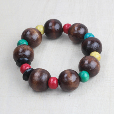 Wood beaded stretch bracelet, 'Joyful Together' - Brown and Multi-Color Wood Bead Stretch Bracelet from Ghana