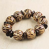 Wood beaded stretch bracelet, 'Peaceful Zebra' - Zebra Motif Wood Beaded Stretch Bracelet from Ghana