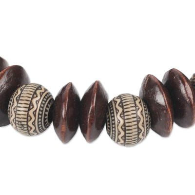 Wood and recycled plastic beaded stretch bracelet, 'Remembering Passion' - Brown Wood and Recycled Plastic Bracelet from Ghana