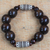 Wood and recycled plastic beaded stretch bracelet, 'Exornam' - Sese Wood and Plastic Beaded Stretch Bracelet from Ghana thumbail