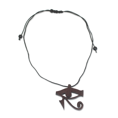Ebony wood pendant necklace, 'Egyptian Eye' - Ebony Wood Egyptian Eye Pendant Necklace from Ghana
