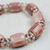 Recycled glass and plastic beaded stretch bracelet, 'Soft Pink' - Recycled Glass and Plastic Beaded Stretch Bracelet in Pink