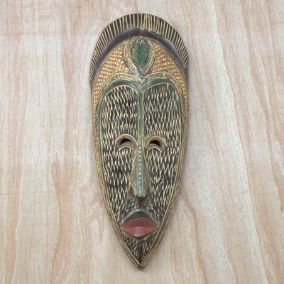 Afrikanische Holzmaske - Erdfarbene afrikanische Sese-Holzmaske aus Ghana