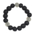 Recycled glass beaded stretch bracelet, 'Monochrome Mood' - Black and White Recycled Glass Beaded Stretch Bracelet
