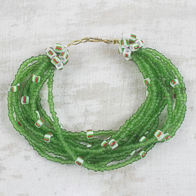 Recycled glass and plastic beaded torsade bracelet, 'Flowing Green Rivers' - Green Striped Recycled Plastic and Glass Beaded Bracelet