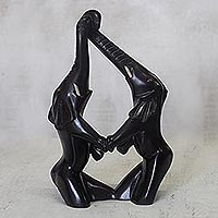 Wood sculpture, 'Elephant Celebration' - Black Wood Sculpture of Two Elephants from Ghana