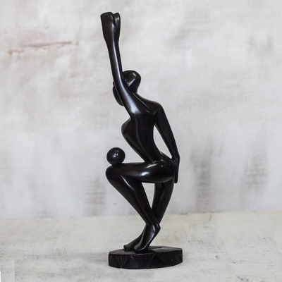 Wood sculpture, 'Soccer Legend' - Black Wood Sculpture of a Soccer Player from Ghana
