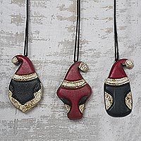 Wood ornaments, 'African Santa' (set of 3) - Santa-Themed Wood Ornaments from Ghana (Set of 3)