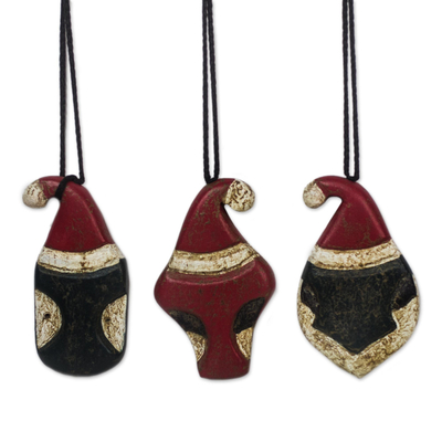 Wood ornaments, 'African Santa' (set of 3) - Santa-Themed Wood Ornaments from Ghana (Set of 3)