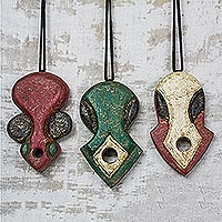 Wood ornaments, 'Punu Masks' (set of 3) - Colorful Wood Mask Ornaments from Ghana (Set of 3)