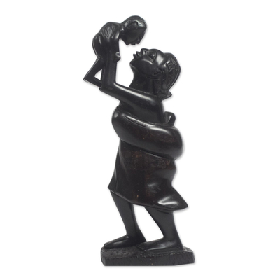 Wood sculpture, 'Mother's Kisses' - Hand-Carved Sese Wood Mother and Child Sculpture from Ghana
