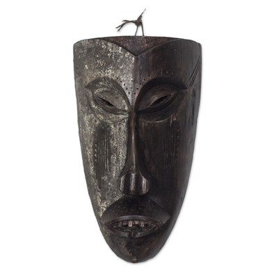 African wood mask, 'Solemn Hunter' - Hand-Carved Antiqued Sese Wood Wall Mask from West Africa