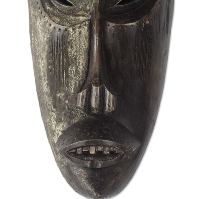 African wood mask, 'Solemn Hunter' - Hand-Carved Antiqued Sese Wood Wall Mask from West Africa