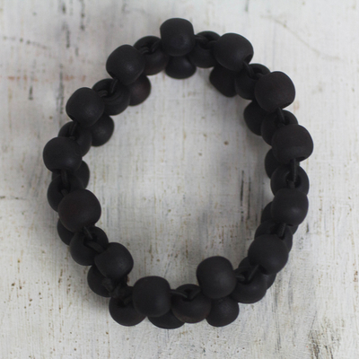 Wood beaded stretch bracelet, 'Black Oblanta' - Black Sese Wood Beaded Stretch Bracelet from Ghana