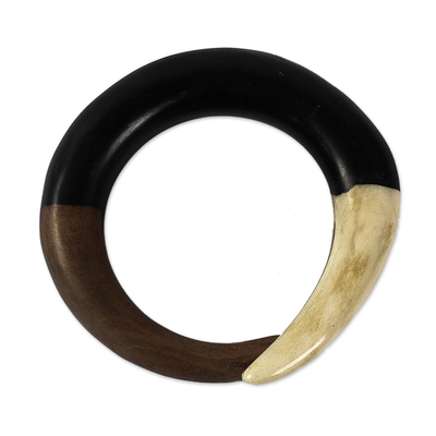Ebony and bone bangle bracelet, 'Bold Curve' - Hand Carved Ebony Wood and Cow Bone Bangle Bracelet
