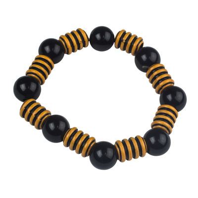 Recycled plastic bead stretch bracelet, 'Modern Buzz' - Bold Black and Yellow Striped Recycled Bead Stretch Bracelet