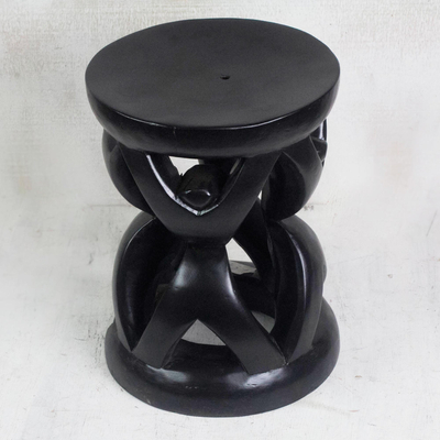 Wood decorative stool, 'Celebrate Unity' - Handmade Wood Decorative Stool in Black from Ghana