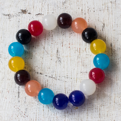 Glass beaded stretch bracelet, 'Rainbow Nkunim' - Colorful Recycled Glass Beaded Stretch Bracelet from Ghana