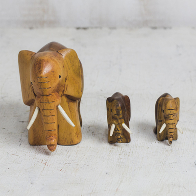 Ebony wood figurines, 'Leading Mother' (set of 3) - Ebony Wood Elephant Figurines from Ghana (Set of 3)