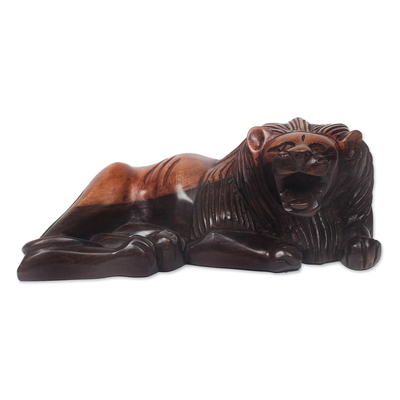 Ebony wood sculpture, 'Relaxing Lion' - Hand-Carved Ebony Wood Lion Sculpture from Ghana