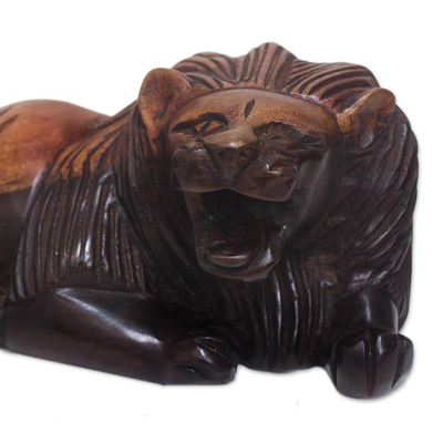 Ebony wood sculpture, 'Relaxing Lion' - Hand-Carved Ebony Wood Lion Sculpture from Ghana