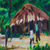 'Village Scene' - Pintura impresionista de escena de pueblo firmada de Ghana