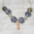 Ceramic and recycled glass beaded pendant necklace, 'Elolo Beauty' - Ceramic and Recycled Glass Beaded Pendant Necklace