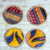Wood coasters, 'African Hospitality' (set of 4) - Multicolored Wood and Cotton Coasters from Ghana (Set of 4)