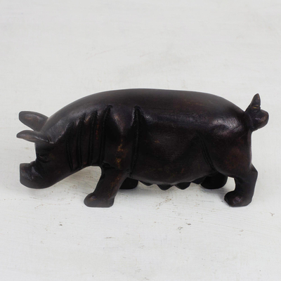 Holzfigur - Schwarze Schweinefigur aus Sese-Holz aus Ghana