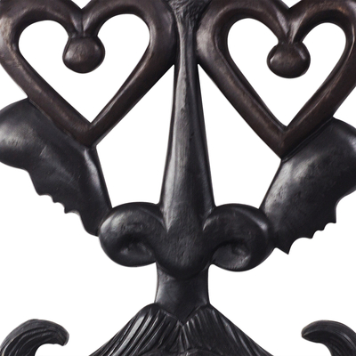 Wood relief panel, 'Mustached Lover' - Heart-Themed Mustached Wood Relief Panel from Ghana