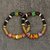 Beaded stretch bracelets, 'Emotional Beauty' (pair) - Wood and Recycled Glass Stretch Bracelets (Pair)