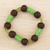 Recycled glass and plastic beaded stretch bracelet, 'Eco Seshi' - Green Recycled Glass and Plastic Beaded Stretch Bracelet