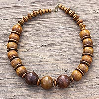 Wood beaded necklace, 'Promise of Beauty' - Sese Wood Necklace with Beads and Discs from Ghana