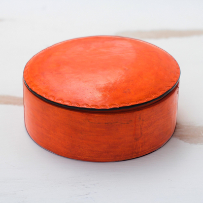 Leather decorative box, 'Orange Tarodit' - Circular Orange Leather Decorative Box from Ghana