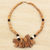 Batik onyx and cow bone beaded pendant necklace, 'Boho Tribe' - Batik Onyx and Bone Beaded Pendant Necklace from Ghana