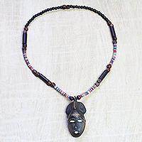 Wood and recycled glass beaded pendant necklace, 'Baule Tribe' - Baule-Themed Wood and Glass Beaded Pendant Necklace
