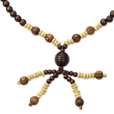 Wood beaded pendant necklace, 'Beaded Dancer' - Beaded Wooden Pendant Necklace from Ghana
