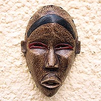 African wood mask, Inquisitive Dan