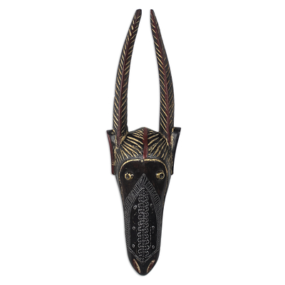 Máscara africana de madera y latón. - Máscara de antílope acentuada en latón y aluminio