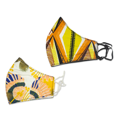 Gesichtsmasken aus Baumwolle, 'Beauty and Fashion' (Paar) - 2 Konturierte Gesichtsmasken aus gelber Baumwolle mit afrikanischem Druck