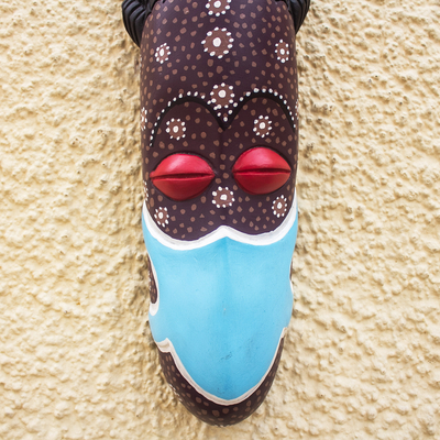 Afrikanische Holzmaske - Handgefertigte Wandmaske aus Holz mit Schutzmotiv