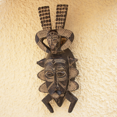 Afrikanische Holzmaske - Handgeschnitzte afrikanische Maske aus Sese-Holz