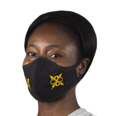 Gesichtsmaske aus Baumwolle, 'Pempamsie in Gelb'. - Schwarze Adrinka-Pempamsie-Gesichtsmaske mit elastischen Ohrschlaufen