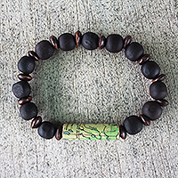 Sese wood and recycled paper beaded stretch bracelet, 'World Traveler' - Sese Wood and Recycled Paper Bead Unisex Bracelet